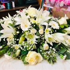white casket spray